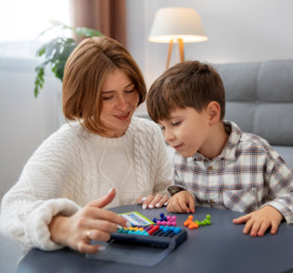 woman and a boy playing