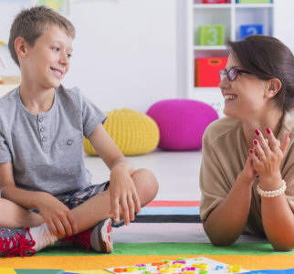 woman and a boy looking at each other