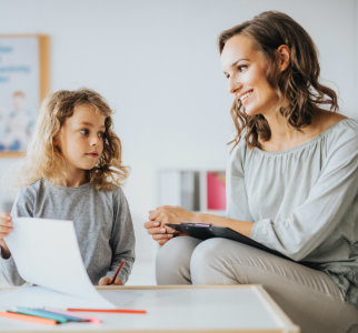woman and a girl smiling